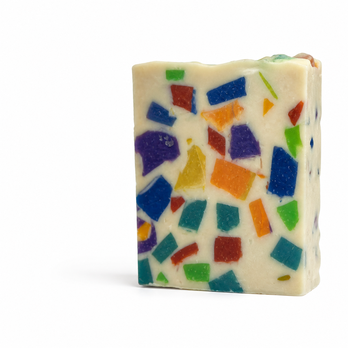 Monkey Farts goat milk soap bars with bright confetti chunks, a fruity banana and berry scent
