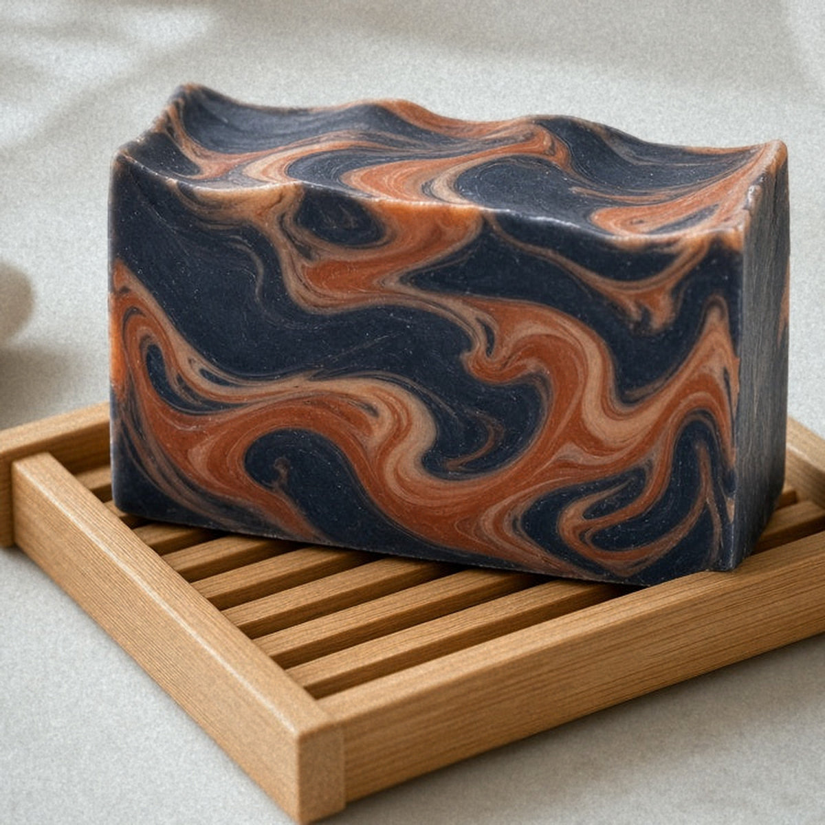 Perfect Man Cologne goat milk soap on a bamboo soap dish
